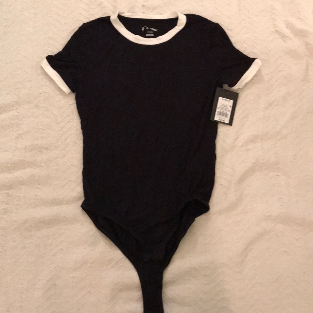 white rimmed body suit